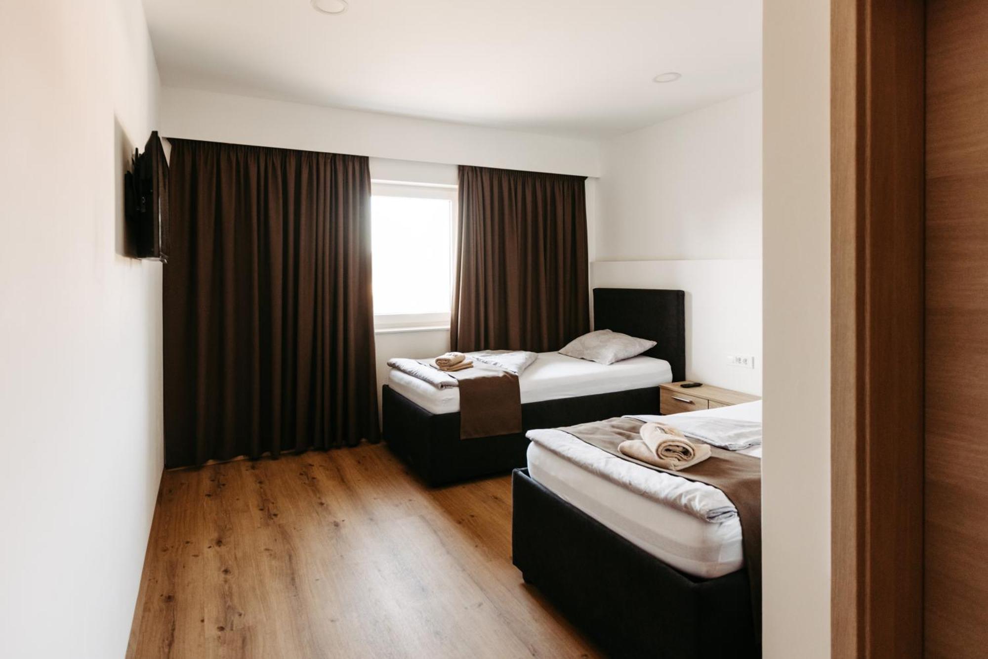 Camera Doppia con Letti Singoli con Letto Supplementare